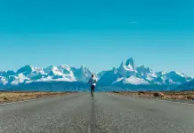 Woman running at mountains